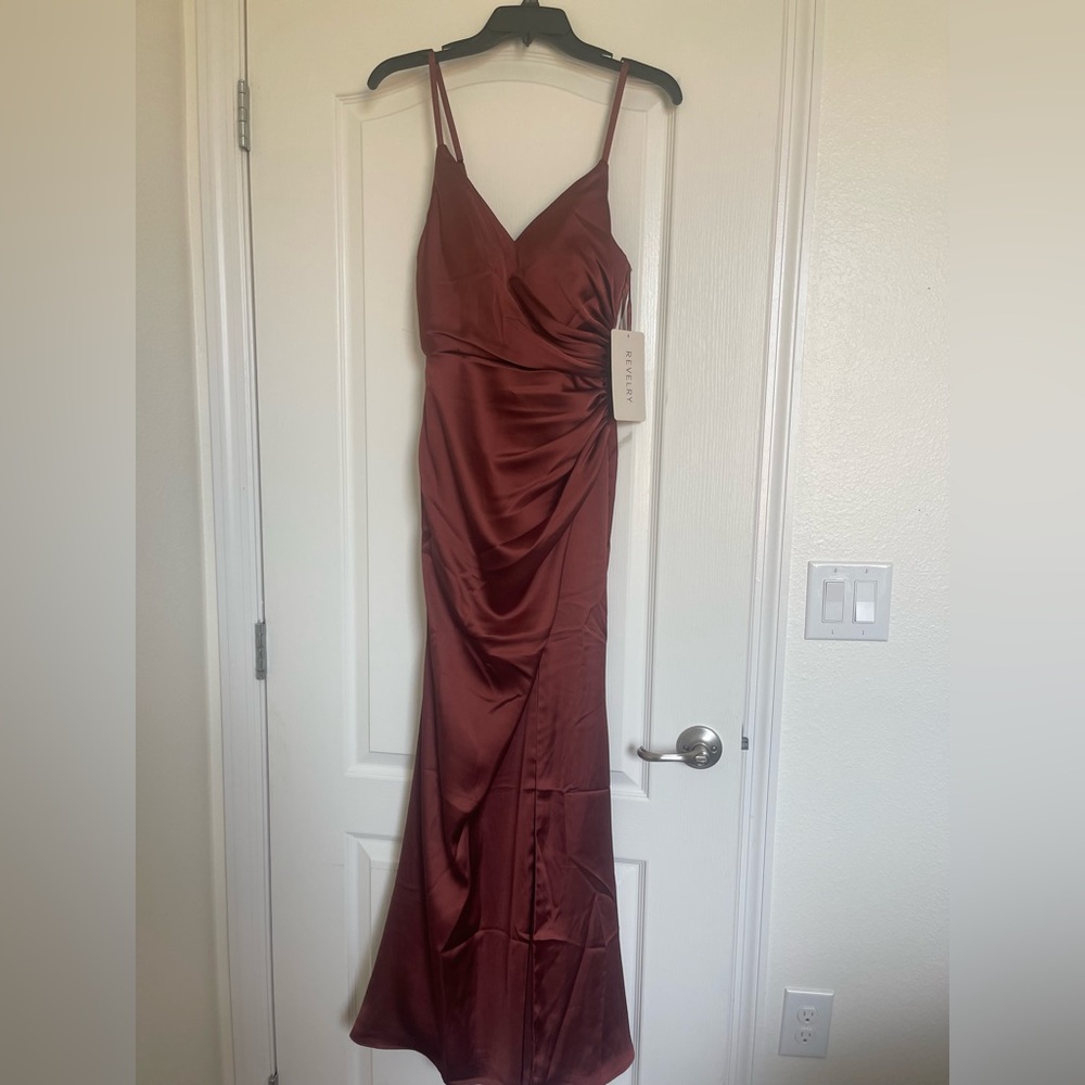 Lined long bridesmaid or special event dress. Never worn size 2